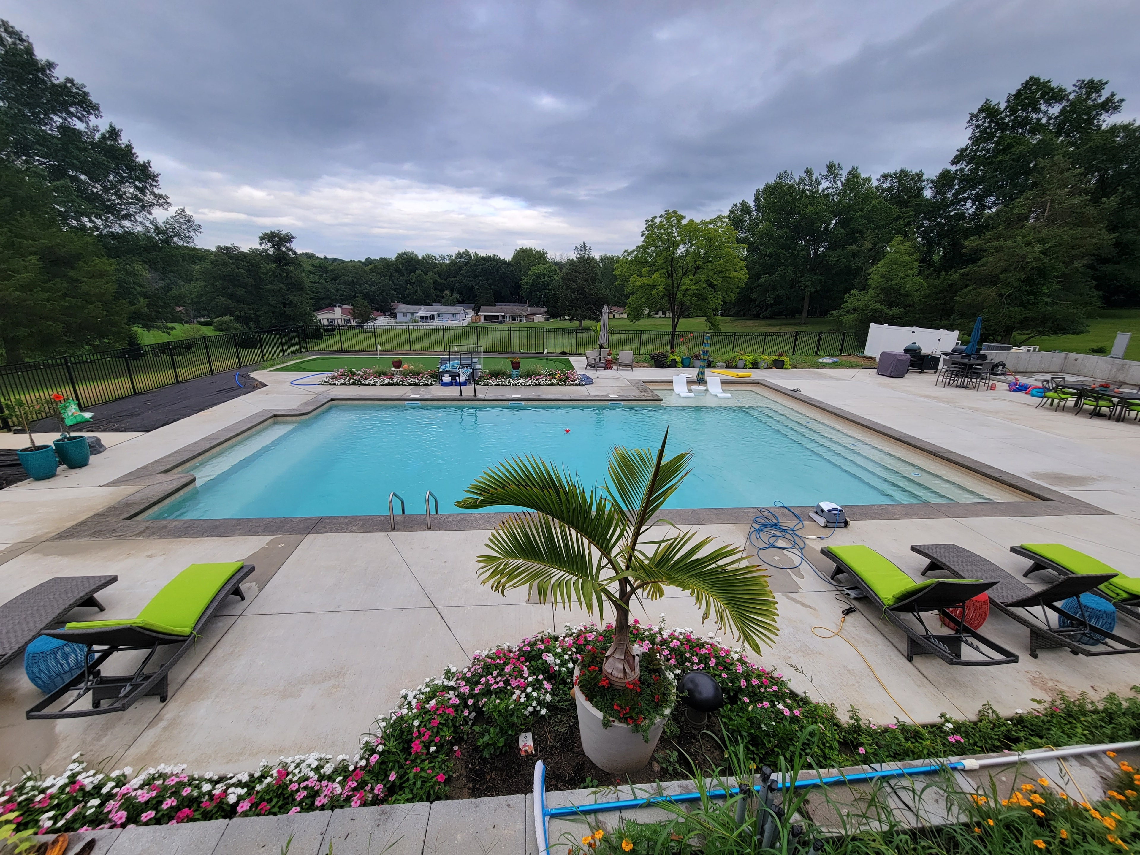 Family-sized gathering spaces by Tri-County Pools